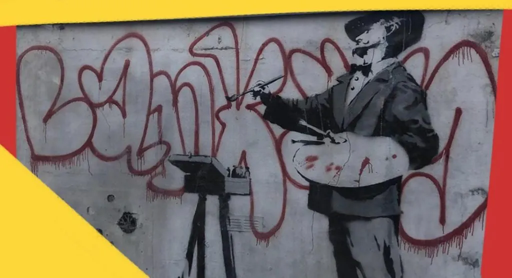 Il pittore di graffiti, il murale di Banksy a Notting Hill